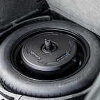 NVX QBSTA 900W Max (300W RMS) 11" Powered Spare Tire Subwoofer Box with Built-in Amp and Remote Bass Knob, Easy to Install in Cars